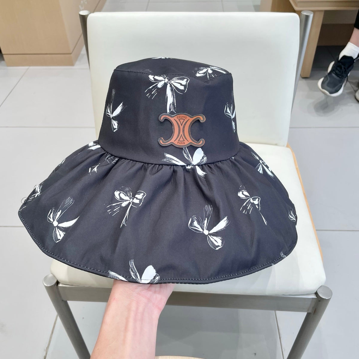 CELINE 25S BUCKET BOW HAT 733402 IN BLACK