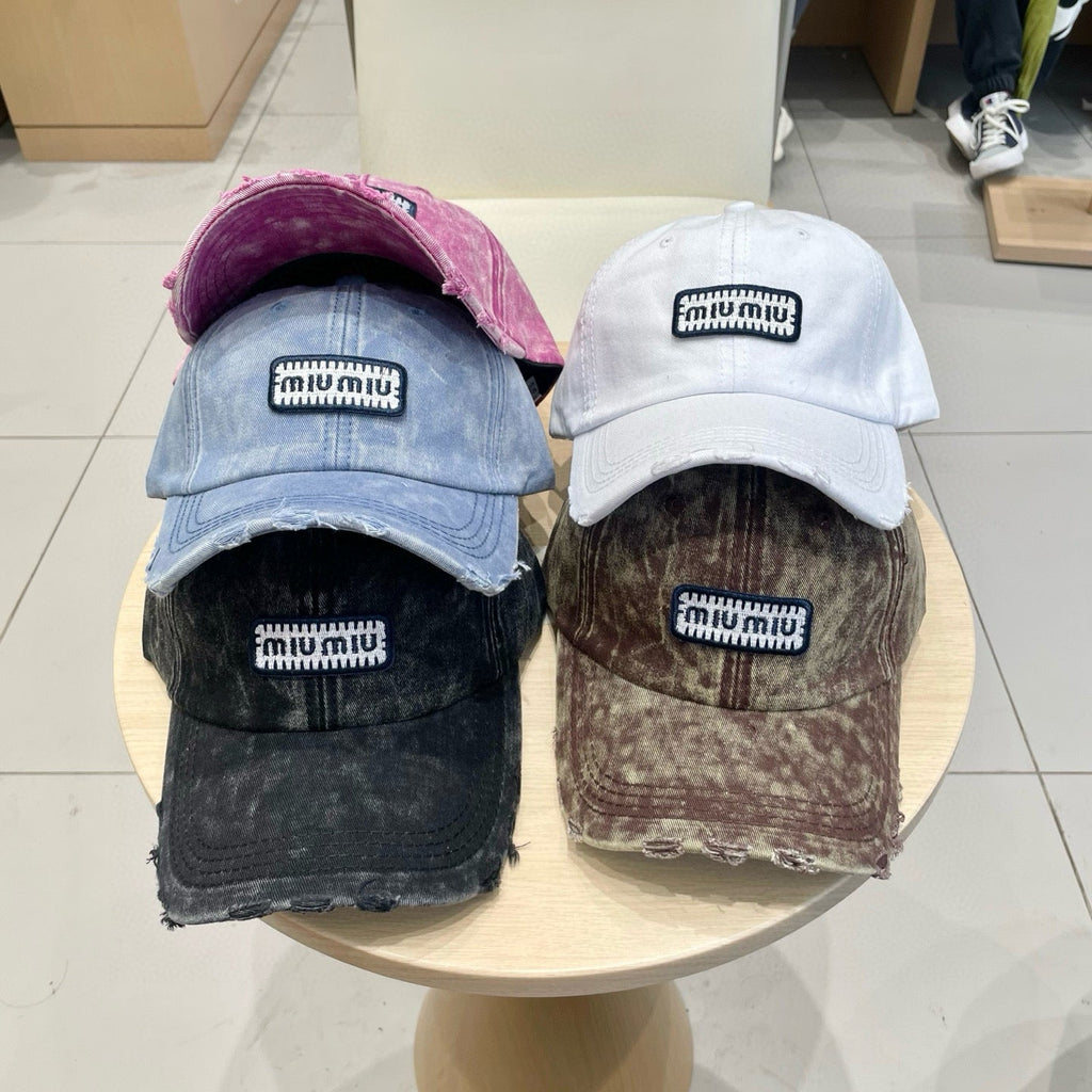 MIU MIU MM DISTRESSED FABRIC BASEBALL CAP IN BROWN WITH EMBROIDERED LOGO