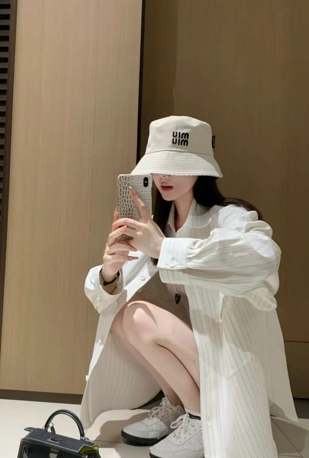 MIU MIU MM CLASSIC REVERSIBLE BUCKET HAT IN LIGHT BEIGE AND BLACK FABRIC